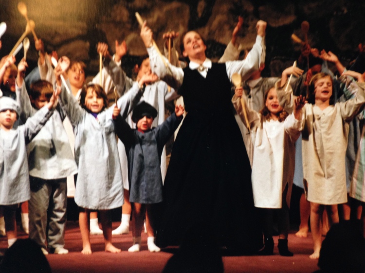 Me performing as the head of an orphanage in our church musical, "A Time for Christmas."  That's tiny little Cody in the blue nightgown on the left and Liza on my right.  Lena isn't in this shot, but we all danced and sang with wooden spoons about how God would provide our breakfast--in an English accent, no less:)